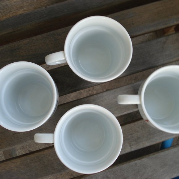 WORLD MARKET STACKING COFFEE MUGS SET OF 4 CITIES AROUND THE WORLD - Picture 3 of 4